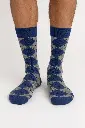 Súbete los calcetines elegantes.webp